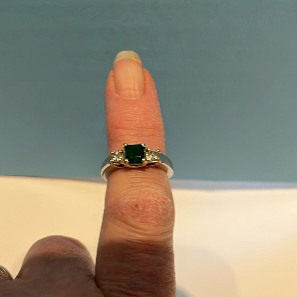 Beautiful genuine emerald and diamond ring.